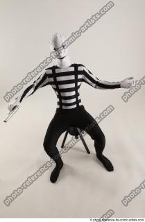 17 2019 01 JIRKA SITTING POSE WITH GUN